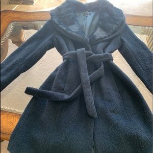 Navy blue coat with fur.